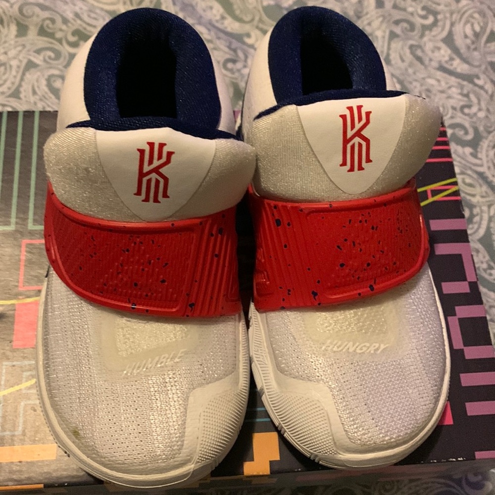 Size 7c white Kyrie with red strap